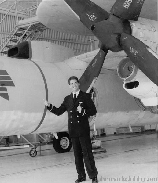 JMC 1985 - 3.JPG - The day John received his NFO wings; standing next to an E-2 NAS Miramar May 1985